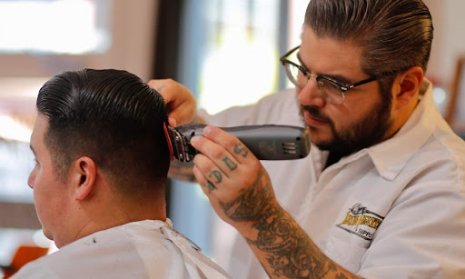 Mike the Barber cutting Hair